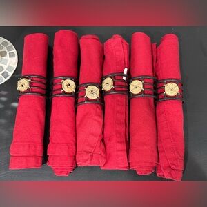 Set of 6 asian inspired napkin rings with red, washable cloth napkins.